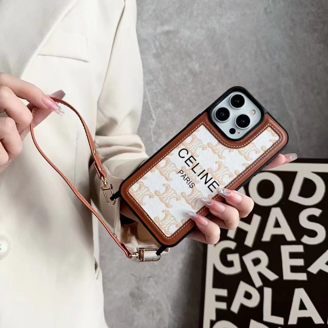 스트랩이 달린 화이트 셀린느 아이폰 케이스 -SZ231124