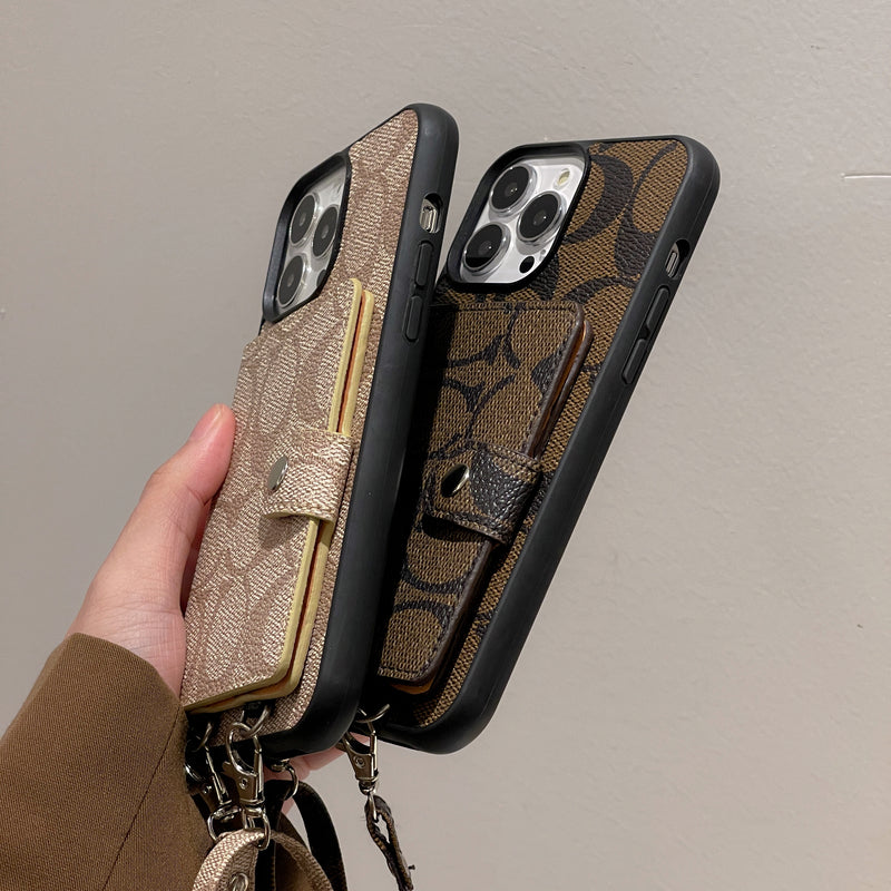 지갑과 스트랩이 있는 Coach iPhone 케이스 화이트 -SZK240402